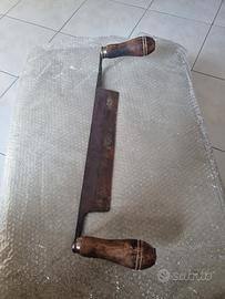 PIALLA CON DUE MANICI