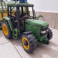Bruder trattore con aratro e rimorchio falciatrice