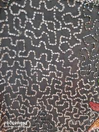 Camicetta in seta ricamata con perline