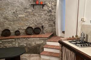 4 appartamenti con terreno più annesso in mulino