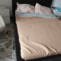 struttura letto legno moderno
