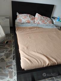 struttura letto legno moderno