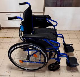 Carrozzina large per disabilità e cuscino