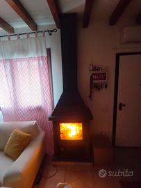 camino a legna con tubi acciaio