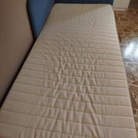 letto singolo con testata imbottita