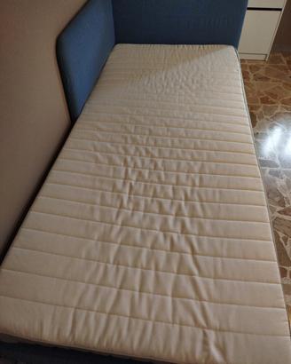 letto singolo con testata imbottita