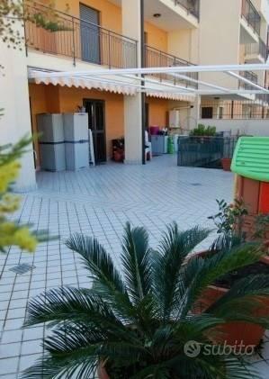 Appartamento con giardino e terrazzo