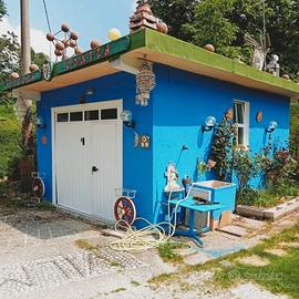 Casa con ampio giardino