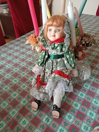 bambola in porcellana e stoffa 