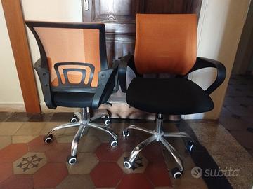 Coppia di poltroncine da ufficio con braccioli