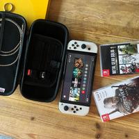 Switch oled custodia e giochi