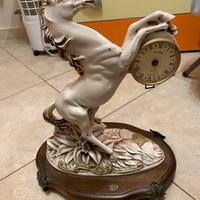 orologio antico a forma di cavallo