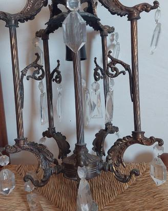 Coppia di lampadari vintage in ottone brunito