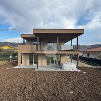 PORZIONE DI BIFAMILIARE A GARDA