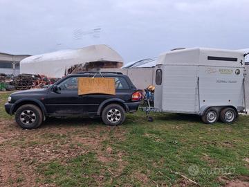 Macchina con trailer