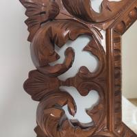 Specchiera ottagonale con cornice traforata