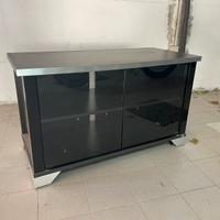 Mobile TV marca “MUNARI” con ante in vetro fumé