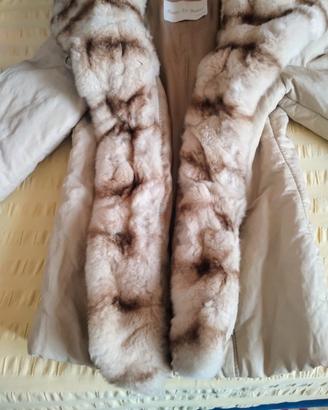 Giacca con collo e abbottonatura in pelliccia