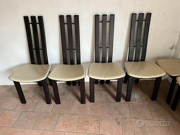 Sedie in legno con seduta in cuoio