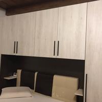 Armadio a ponte camera matrimoniale