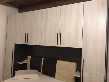 Armadio a ponte camera matrimoniale