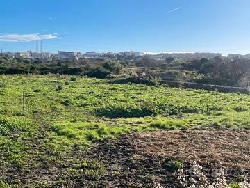 Terreno con caseggiato