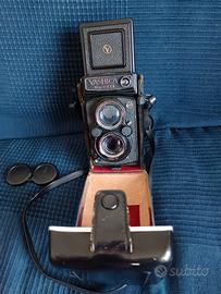 macchine fotografiche vintage e obiettivi