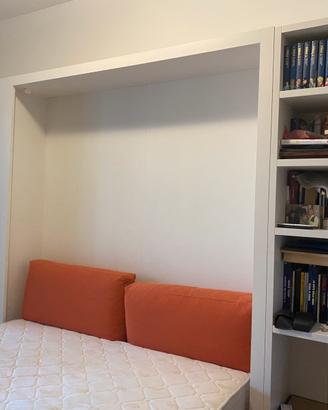 Parete attrezzata con letto a scomparsa