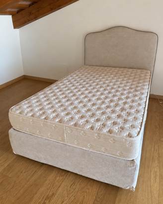 Letto imbottito 125 × 200 cm con testiera sagomata