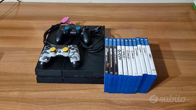 PS4 1000 Gb - 2 Joystick + Giochi 