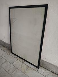Cornice in tinta nero lucido con vetro 130x100 cm.