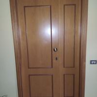 portone in legno a 2 ante