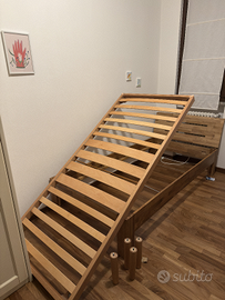 Rete letto con doghe in legno con piedini