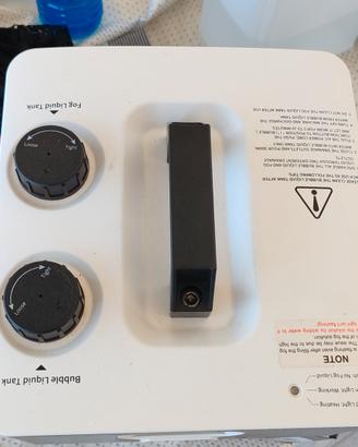 macchina bolle di sapone e di fumo