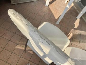 Sedie bianche cromate in ecopelle