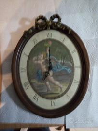 Quadrante con Putti in legno da parete 