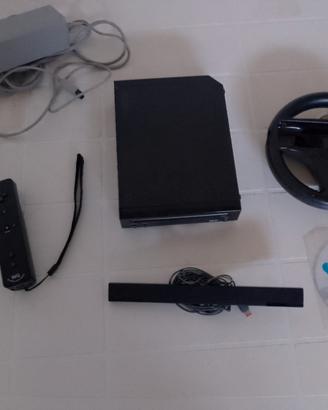 Console Nintendo Wii + videogioco "Mario Kart Wii"