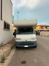 camper mansardato