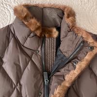 Gilet trapuntato con zip e pelo