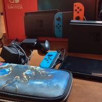 Nintendo switch+ custodia+carica joycon