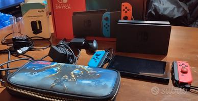 Nintendo switch+ custodia+carica joycon