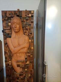 Scultura in legno  con supporti in metallo