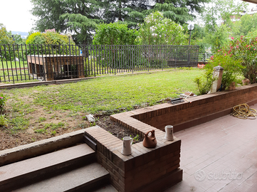 Bilocale con garage e giardino