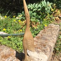 Scultura airone in legno intagliato