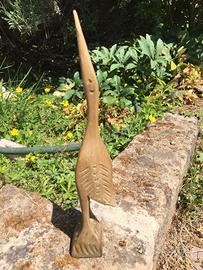 Scultura airone in legno intagliato