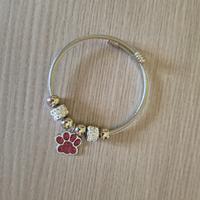 Bracciale rigido  7 charm con zampa 