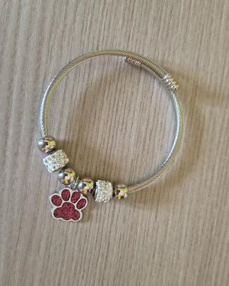 Bracciale rigido  7 charm con zampa 