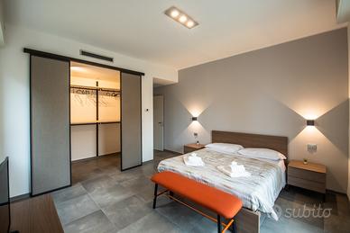 Camere matrimoniali con bagno privato - brevi p