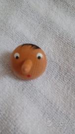 Pinocchio trottola in legno