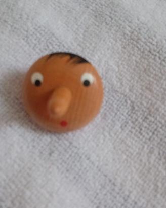 Pinocchio trottola in legno